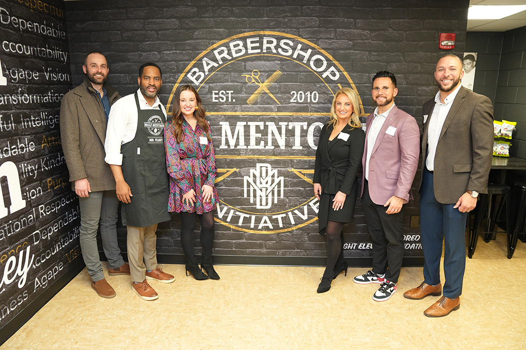 Fred Yeakey and the Eight Eleven Foundation’s Board pose in front of the new home for the Barbershop Male Mentoring Initiative. Left to Right: Jeremy Hunt – Treasurer, Fred Yeakey, Paige Grumme – Secretary, Carlie Oakley – President, Robert Bauscher, and Nate Browning (Not Pictured: Mike Scott, Allison Russo, and Erica Turco).