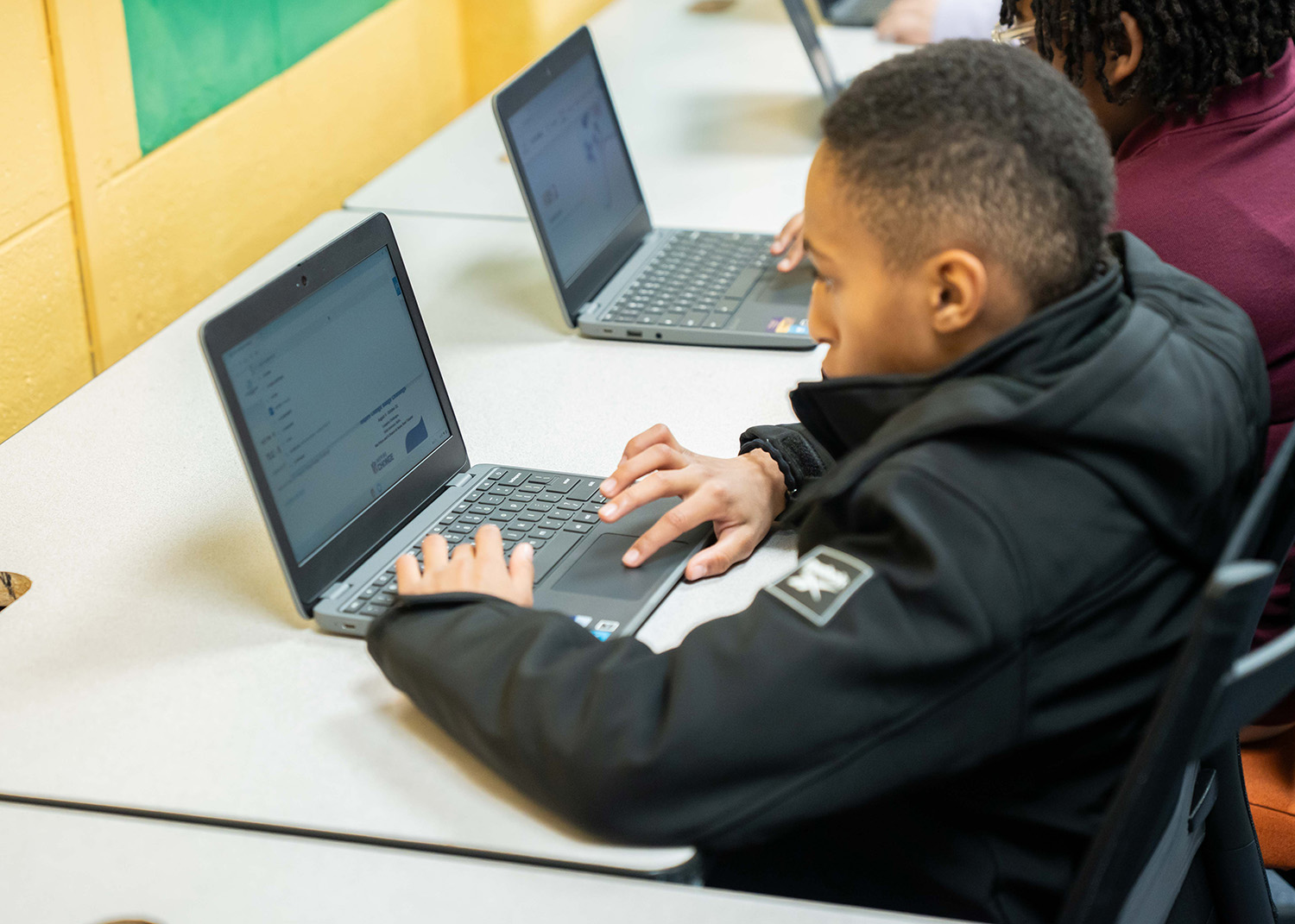 Boys & Girls Club Member Utilizing New Computer Lab Technology