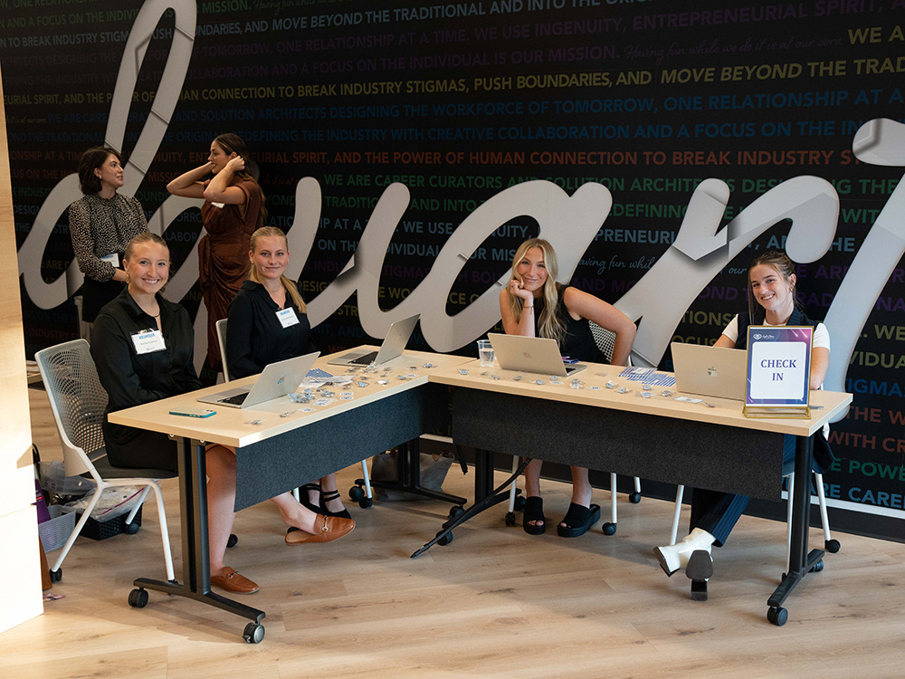 The Eight Eleven Foundation’s Board poses with a 2023 Vespa Primavera 50 that was auctioned off during the evening. <b>Not Pictured: Allison Russo and Jeremy Hunt.